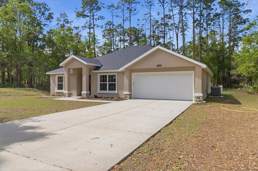 Front exterior of a new home in , Crystal River, FL, highlighting curb appeal (Image 29).