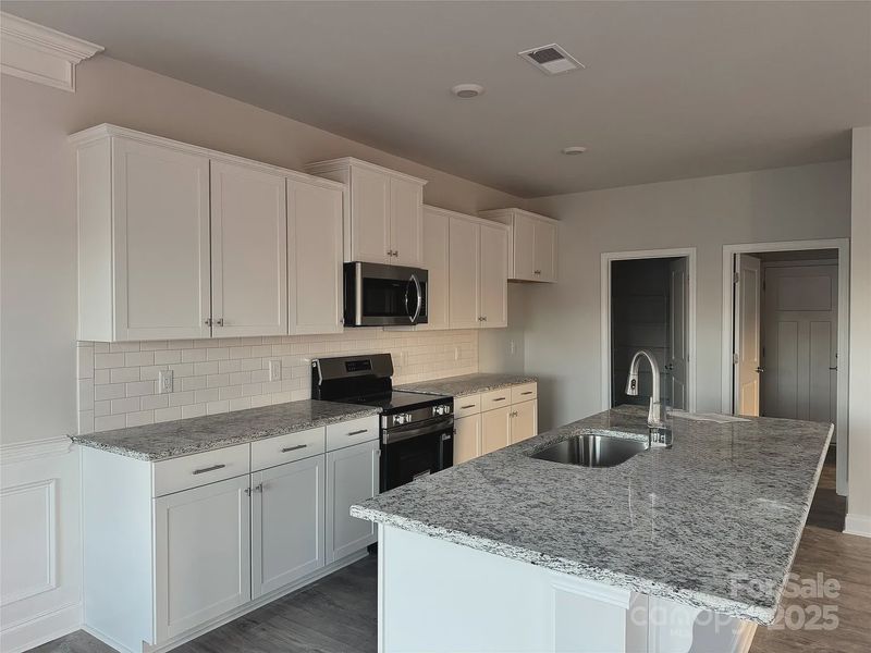 Furnished interior view inside a new home in Village at Parkside, Gastonia (Image 3). Furnished interior view inside a new home in Village at Parkside, Gastonia (Image 3).
