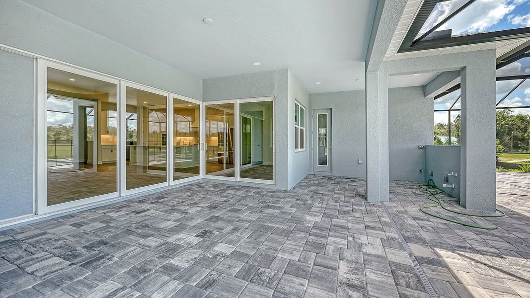Exterior details and patio area of a home in Canoe Creek Real Estate and Homes for Sale in Parrish, FL - Neal Communities, Parrish (Image 30).