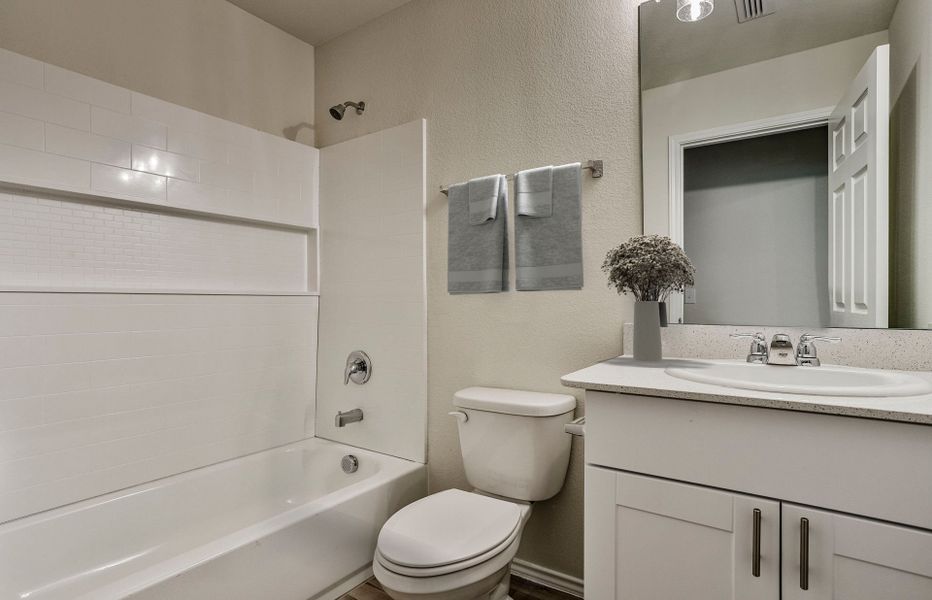 Representative furnished interior of a home built from the Rayburn by Centex in Cottonwood Creek, Howe (Image 5).