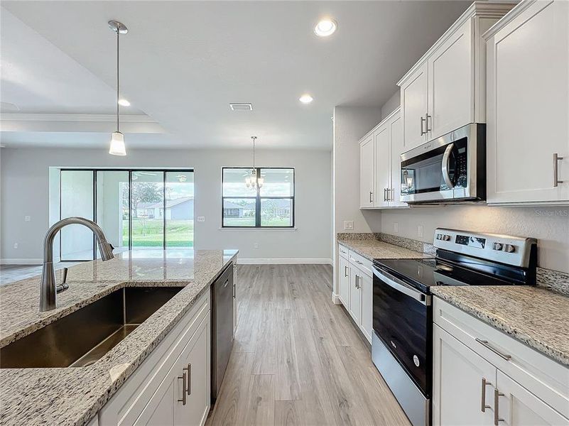 Furnished interior view inside a new home in , Punta Gorda (Image 12).