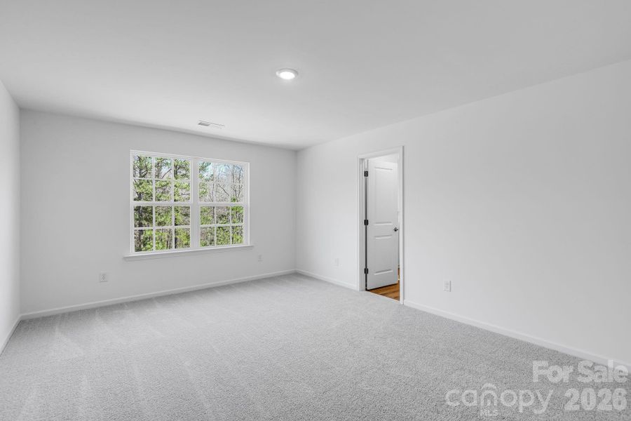 Spacious, unfurnished interior of a new home in Cannon Village, York (Image 9).