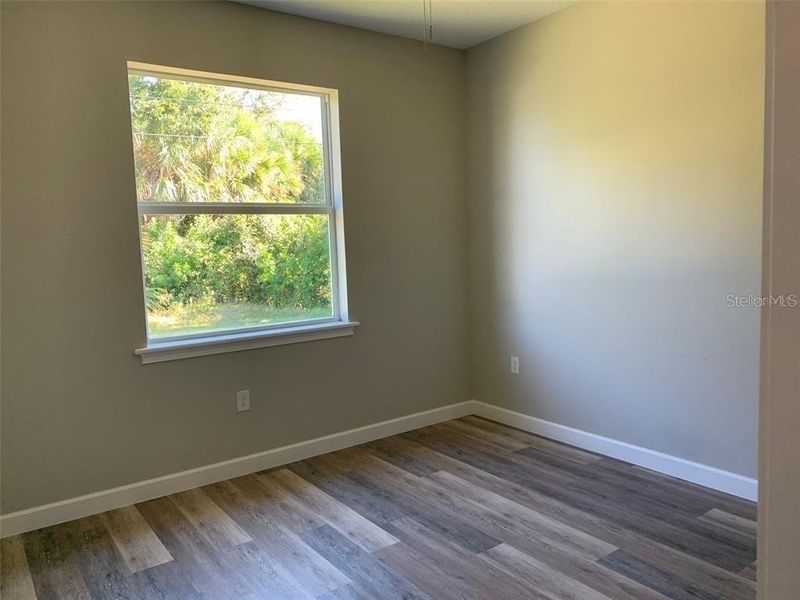 Spacious, unfurnished interior of a new home in , Port Charlotte (Image 20).