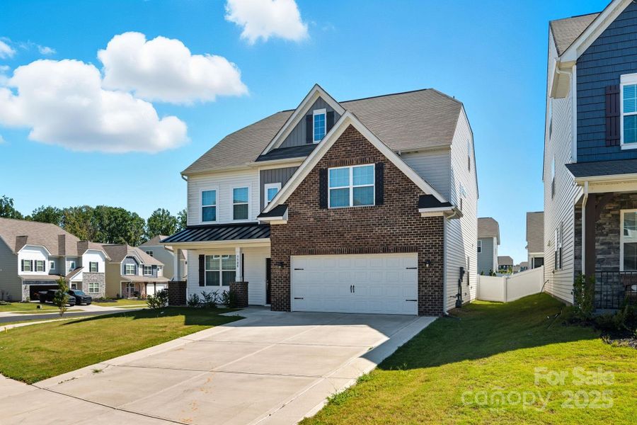 Front exterior of a new home in Walnut Creek: Enclave, Lancaster, SC, highlighting curb appeal (Image 17).