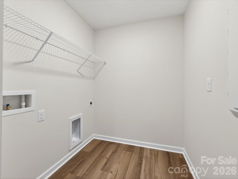 Spacious, unfurnished interior of a new home in North Creek Village, Huntersville (Image 26).