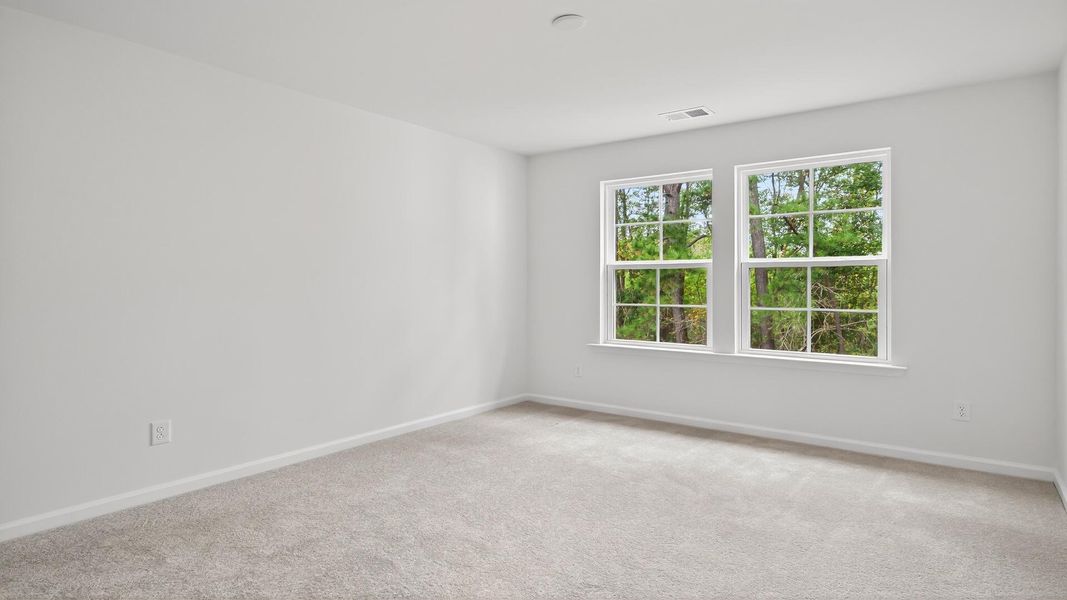 Spacious, unfurnished interior of a new home in Creekside at Andrews, Summerville (Image 25).