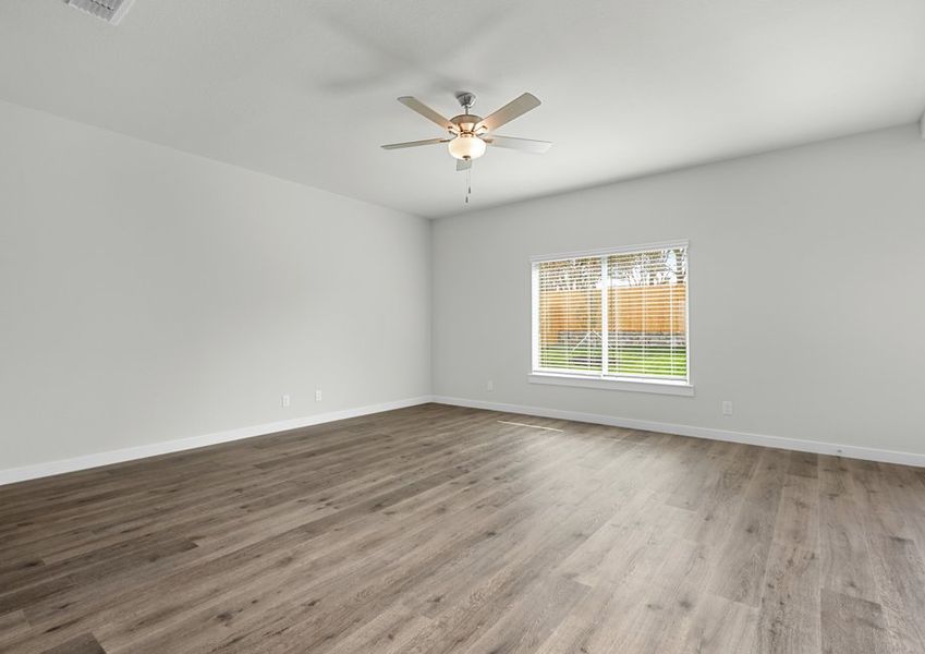 The living room has a large window that lets in great, natural light.