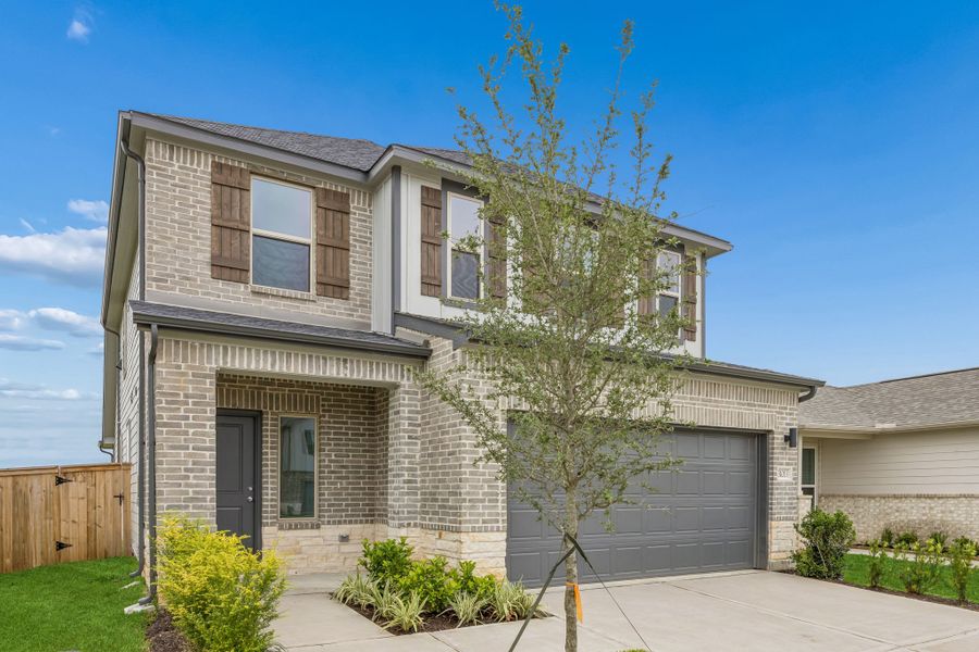 Front exterior of a new home in Riviera Pines, Huffman, TX, highlighting curb appeal (Image 28).