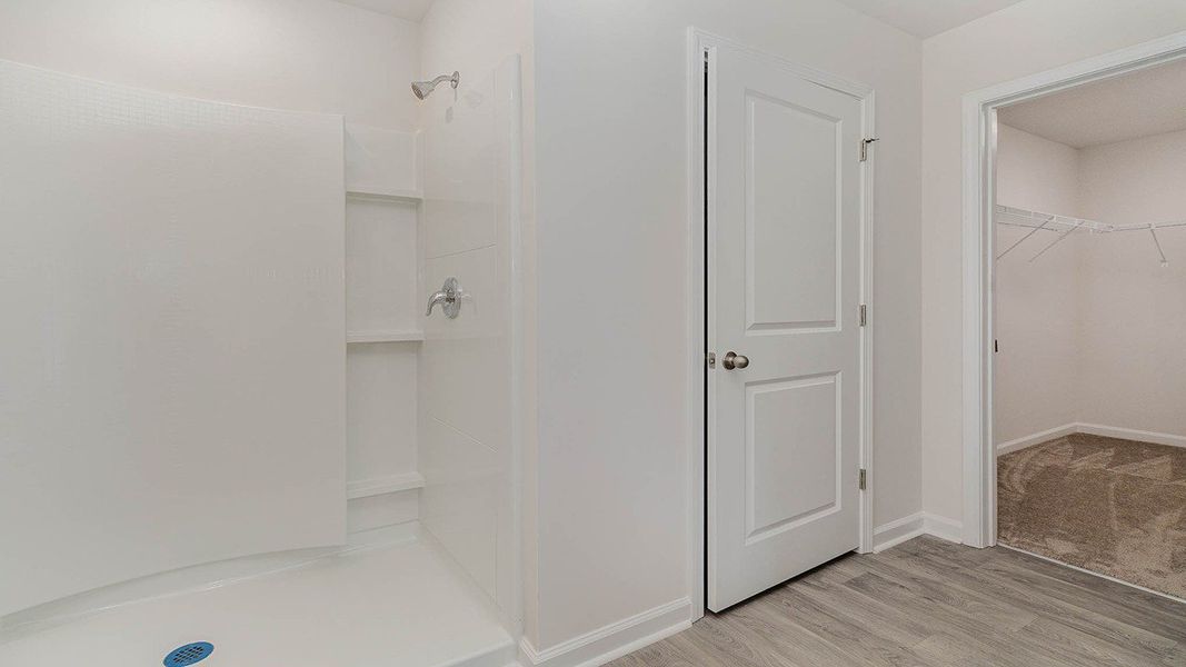 Representative unfurnished interior of a home built from the CALI by D.R. Horton in Heritage Crossing, Conway (Image 11).