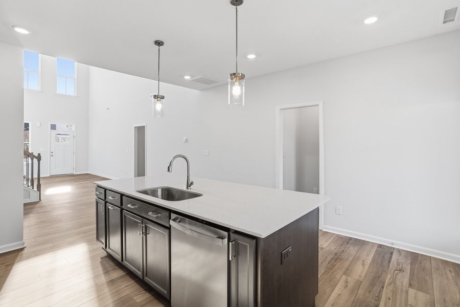 Furnished interior view inside a new home in Ovation at Sweetbrier, Durham (Image 9).