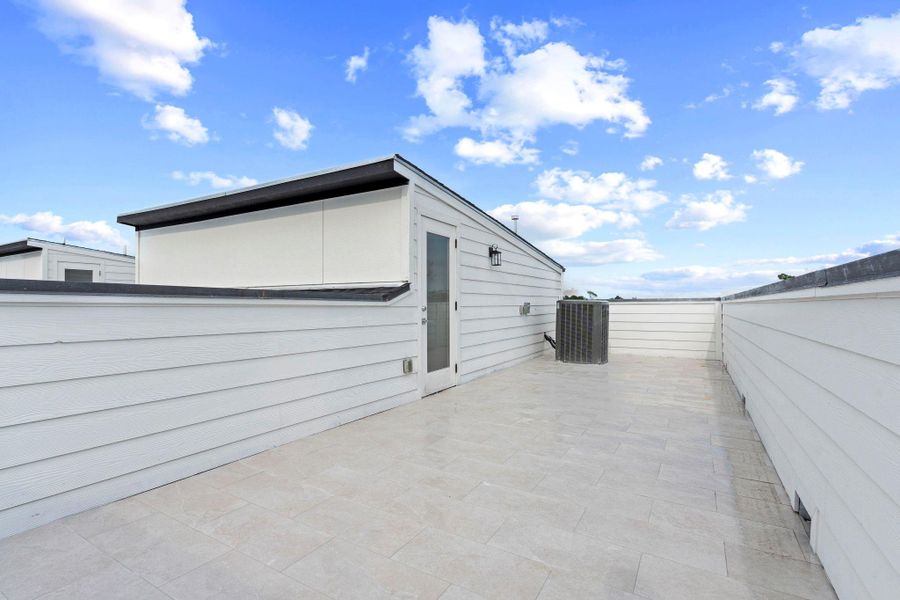 Exterior details and patio area of a home in , Houston (Image 1).