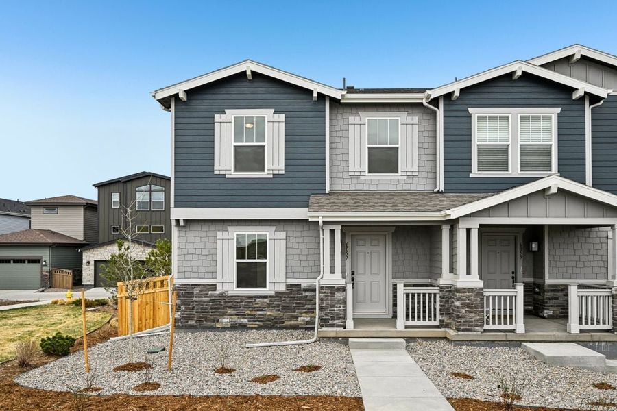 Front exterior of a new home in Painted Prairie Villas, Aurora, CO, highlighting curb appeal (Image 1). Front exterior of a new home in Painted Prairie Villas, Aurora, CO, highlighting curb appeal (Image 1).