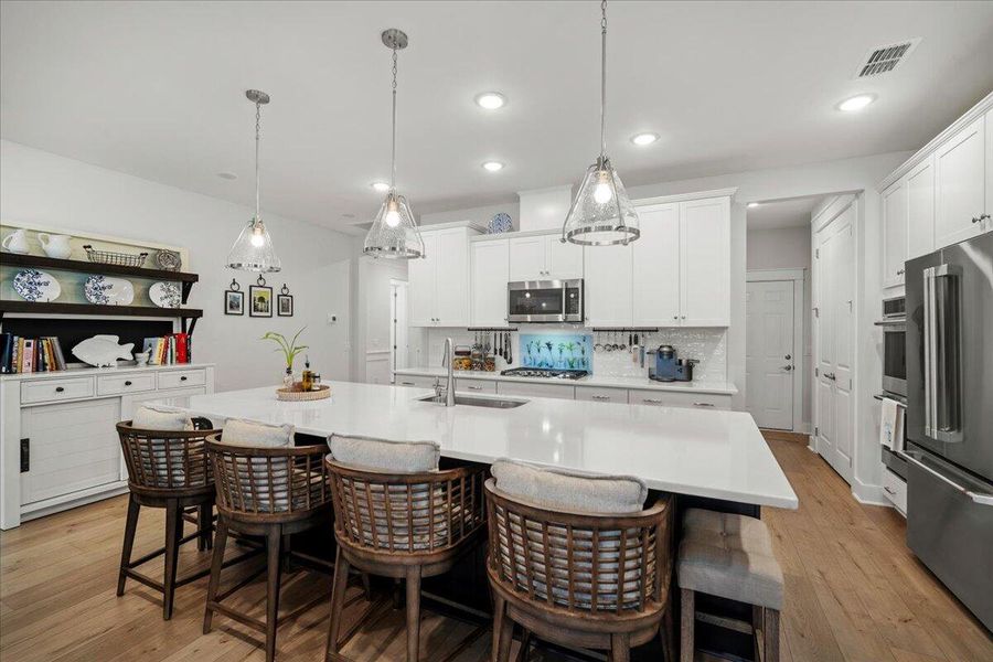 Furnished interior view inside a new home in K. Hovnanian's® Four Seasons at Lakes of Cane Bay, Summerville (Image 15).