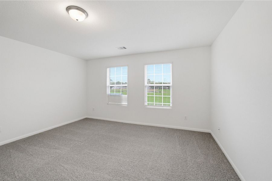 Spacious, unfurnished interior of a new home in The Canopies, Splendora (Image 41).