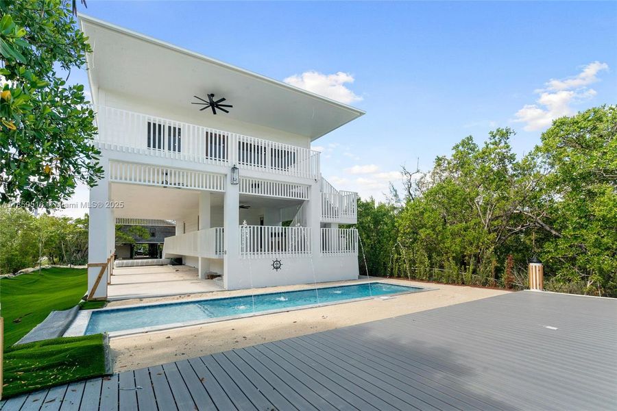 Front exterior of a new home in , Key Largo, FL, highlighting curb appeal (Image 20). Front exterior of a new home in , Key Largo, FL, highlighting curb appeal (Image 20).
