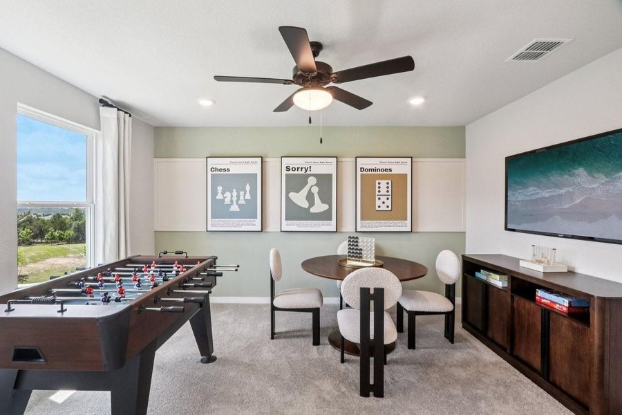 Furnished interior view inside a new home in Stallion Run, Buda (Image 7).