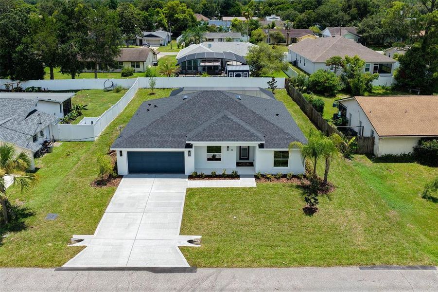 Front exterior of a new home in , Palm Coast, FL, highlighting curb appeal (Image 30). Front exterior of a new home in , Palm Coast, FL, highlighting curb appeal (Image 30).