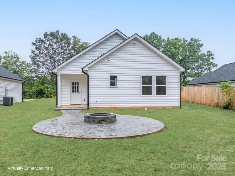 Front exterior of a new home in , East Spencer, NC, highlighting curb appeal (Image 1).