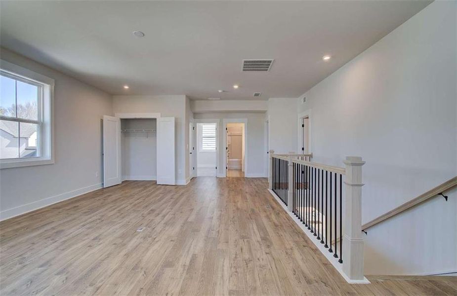 Spacious, unfurnished interior of a new home in The Paddocks at Doc Hughes, Buford (Image 35).