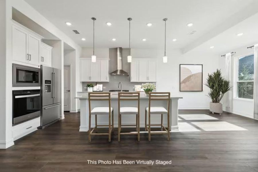 Photo of Pulte model home with same floor plan, not of actual home listed. Photo of Pulte model home with same floor plan, not of actual home listed.