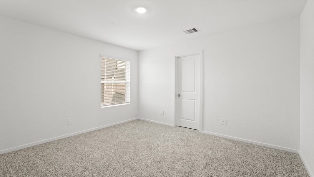 Spacious, unfurnished interior of a new home in Sunterra, Katy (Image 21).
