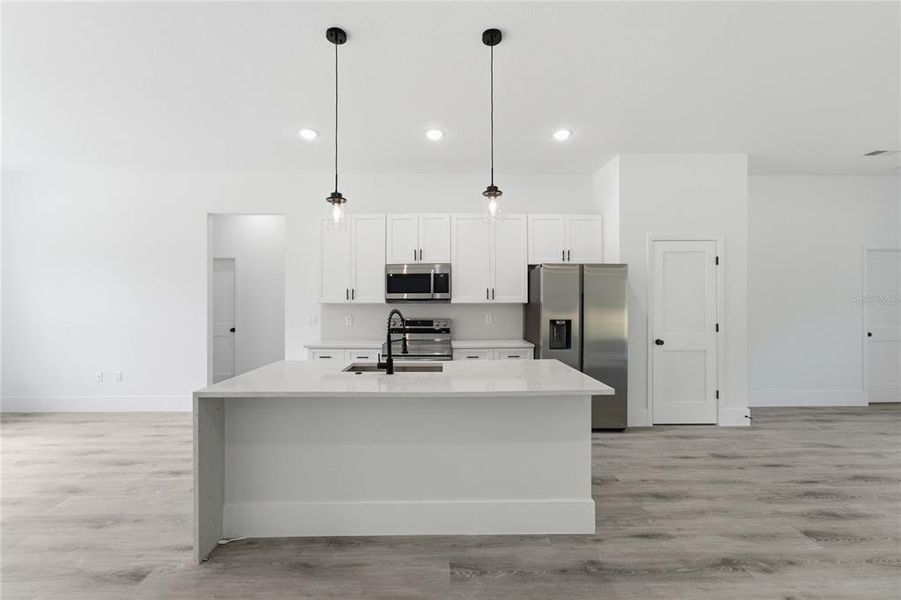 Furnished interior view inside a new home in , Dunnellon (Image 5).