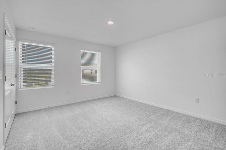 Spacious, unfurnished interior of a new home in The Townhomes at Skye Ranch, Sarasota (Image 34).