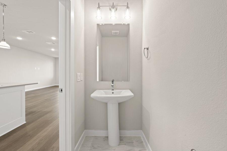 Furnished interior view inside a new home in Wildridge, Oak Point (Image 9).