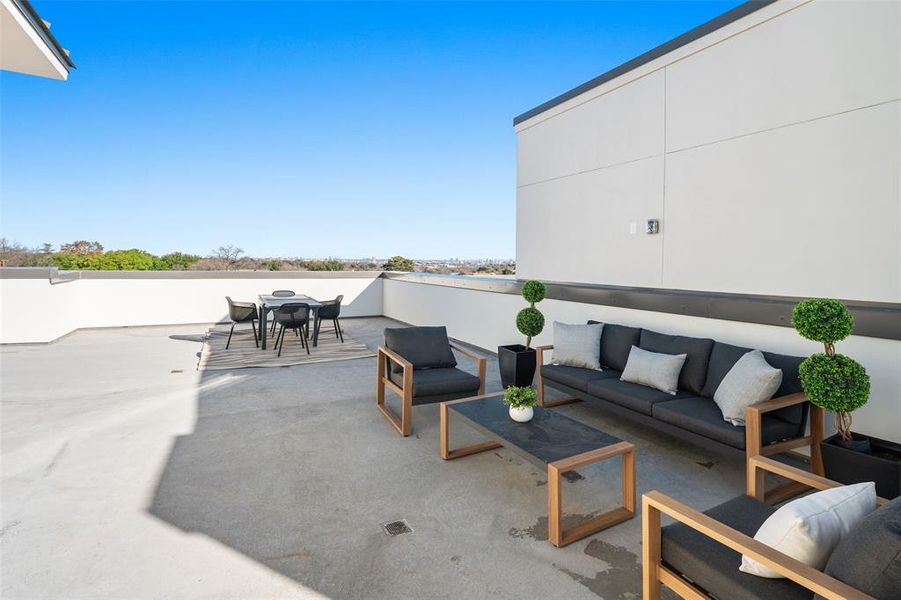 View of patio with an outdoor living space