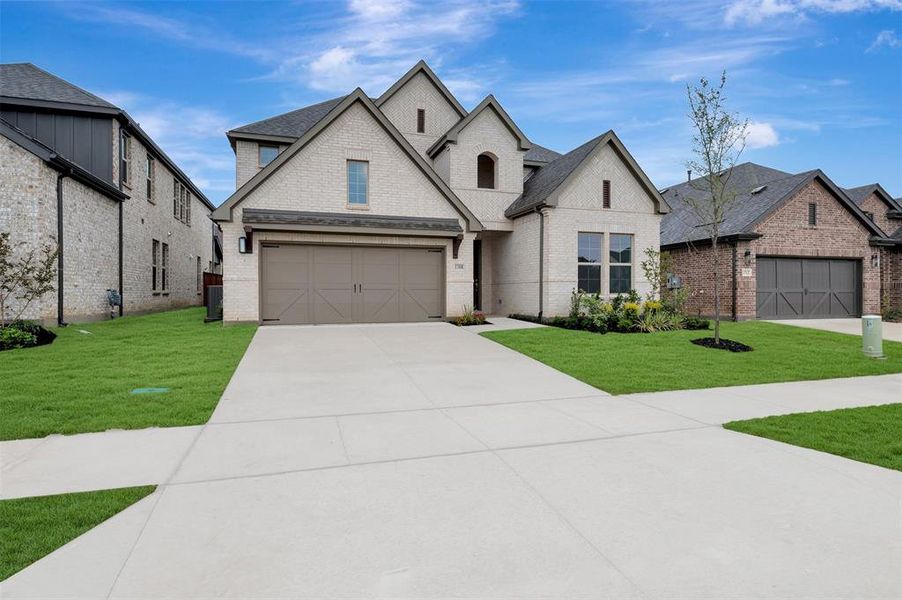 Front exterior of a new home in Lilyana, Celina, TX, highlighting curb appeal (Image 2). Front exterior of a new home in Lilyana, Celina, TX, highlighting curb appeal (Image 2).