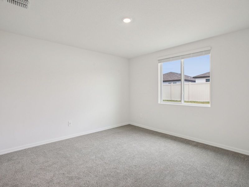 Spacious, unfurnished interior of a new home in Magnolia Bay - Premier Series, Nokomis (Image 12).