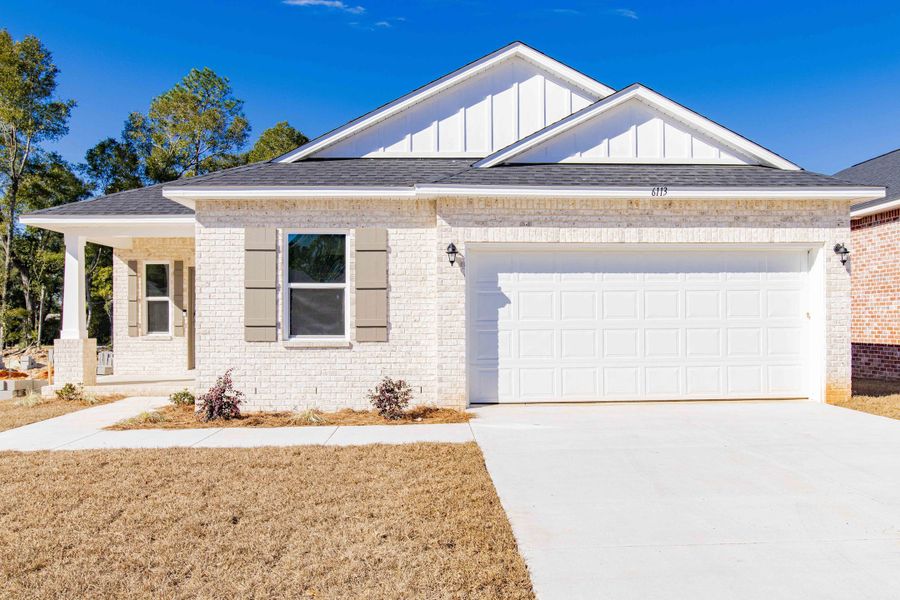 Representative exterior photo of a completed home built from the Ashton by Maronda Homes in Malabar Springs, Palm Bay, FL (Image 28).
