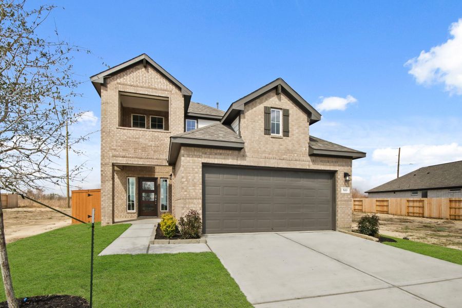 Front exterior of a new home in River Ranch Trails, Angleton, TX, highlighting curb appeal (Image 16). Front exterior of a new home in River Ranch Trails, Angleton, TX, highlighting curb appeal (Image 16).