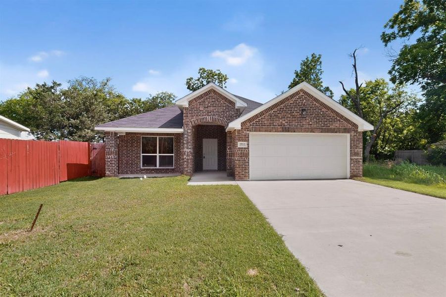 Front exterior of a new home in , Greenville, TX, highlighting curb appeal (Image 22). Front exterior of a new home in , Greenville, TX, highlighting curb appeal (Image 22).