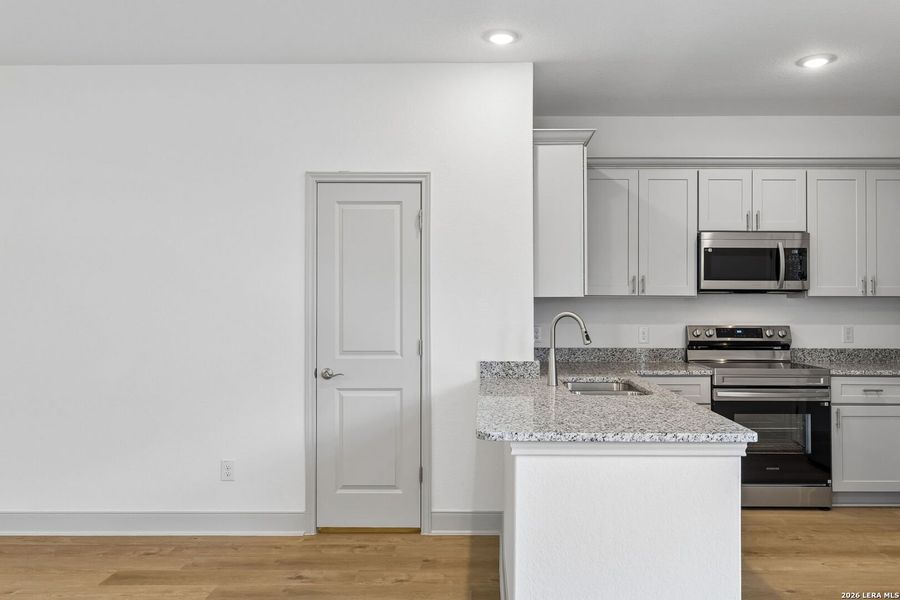 Furnished interior view inside a new home in Magnolia Village North, San Antonio (Image 14).