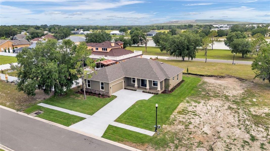 Front exterior of a new home in , Bartow, FL, highlighting curb appeal (Image 27). Front exterior of a new home in , Bartow, FL, highlighting curb appeal (Image 27).