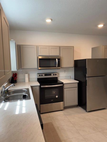 Furnished interior view inside a new home in , Pompano Beach (Image 10).