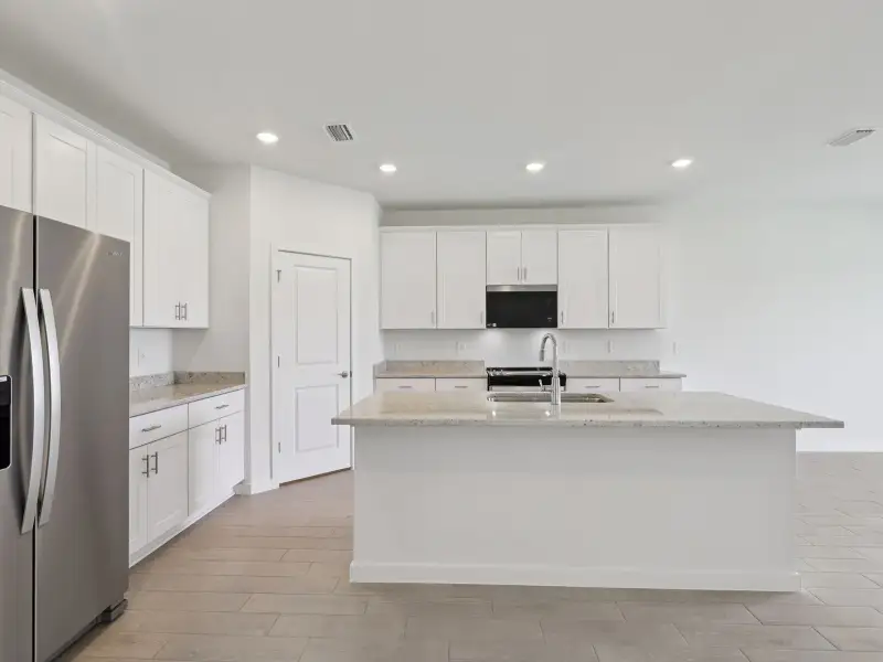 Furnished interior view inside a new home in Flagler Village - Signature Series, Palm Coast (Image 3).