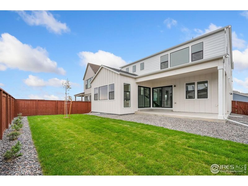Exterior details and patio area of a home in Festival at RainDance, Windsor (Image 2).