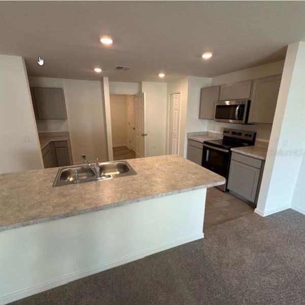 Furnished interior view inside a new home in Palm Coast: Value Collection, Palm Coast (Image 7).