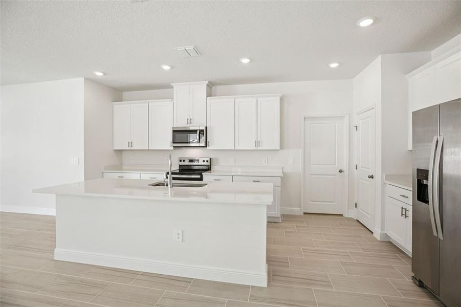 Furnished interior view inside a new home in Cyrene at Minneola - Villas, Minneola (Image 16).