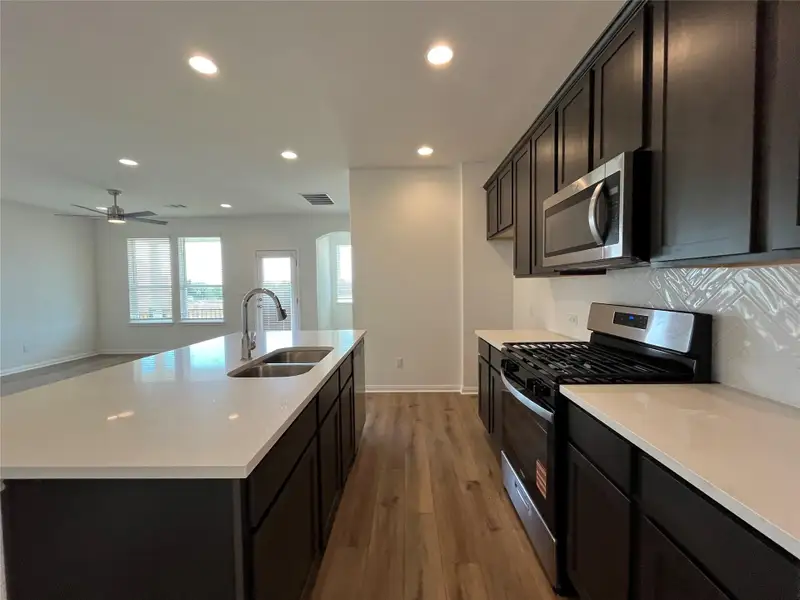 Furnished interior view inside a new home in Wellspring, Hutto (Image 11). Furnished interior view inside a new home in Wellspring, Hutto (Image 11).