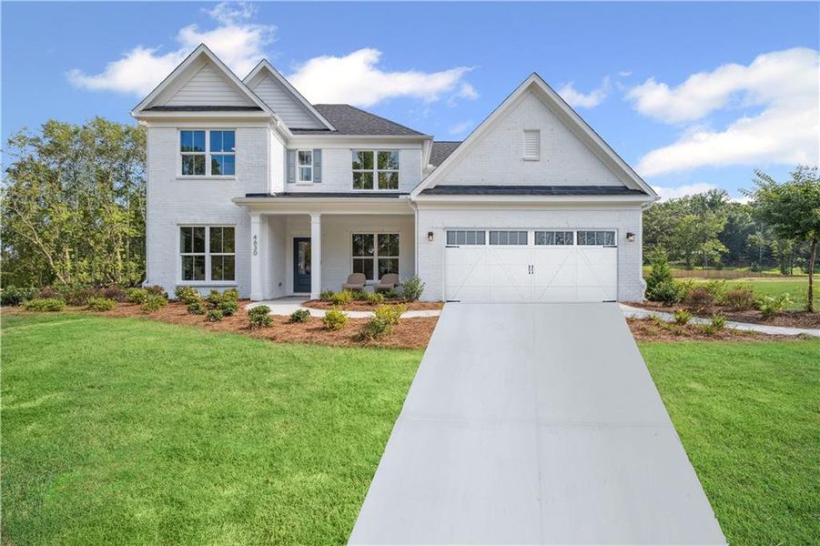 Front exterior of a new home in Rose Creek, Cumming, GA, highlighting curb appeal (Image 24). Front exterior of a new home in Rose Creek, Cumming, GA, highlighting curb appeal (Image 24).