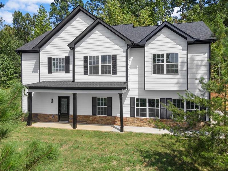 Front exterior of a new home in , Gainesville, GA, highlighting curb appeal (Image 15).