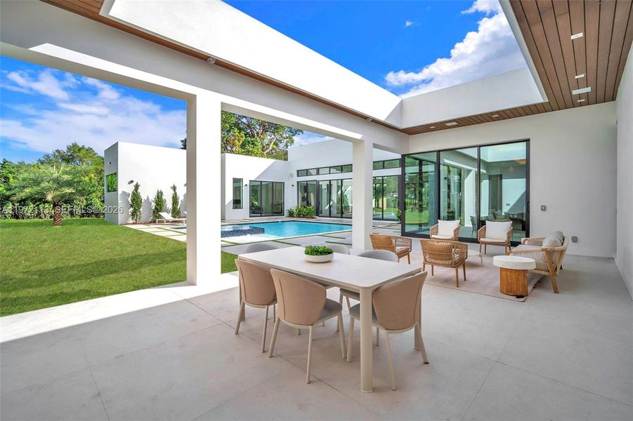 Exterior details and patio area of a home in , Miami (Image 25). Exterior details and patio area of a home in , Miami (Image 25).