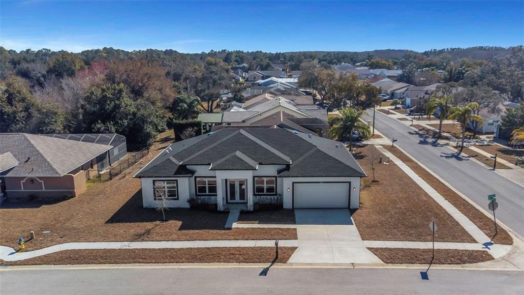 Front exterior of a new home in , Hudson, FL, highlighting curb appeal (Image 34).