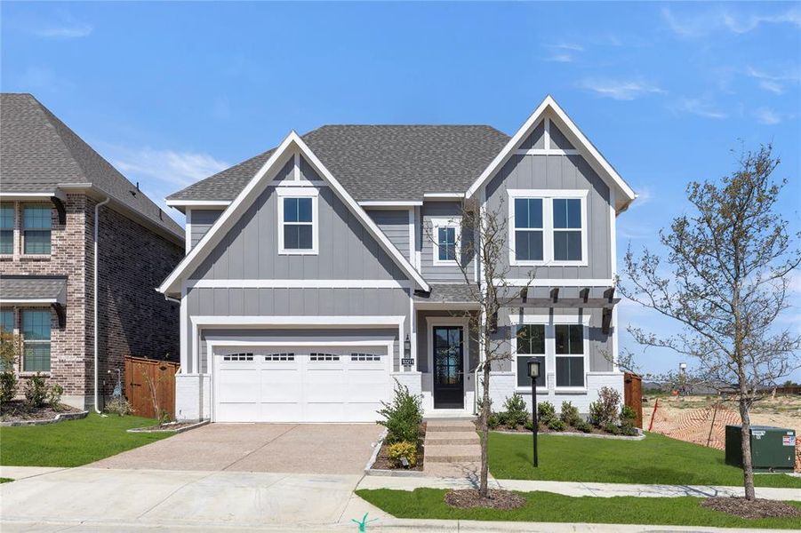 Front exterior of a new home in Inspiration, Lucas, TX, highlighting curb appeal (Image 2). Front exterior of a new home in Inspiration, Lucas, TX, highlighting curb appeal (Image 2).