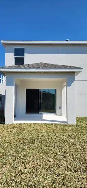 Exterior details and patio area of a home in , Davenport (Image 3).