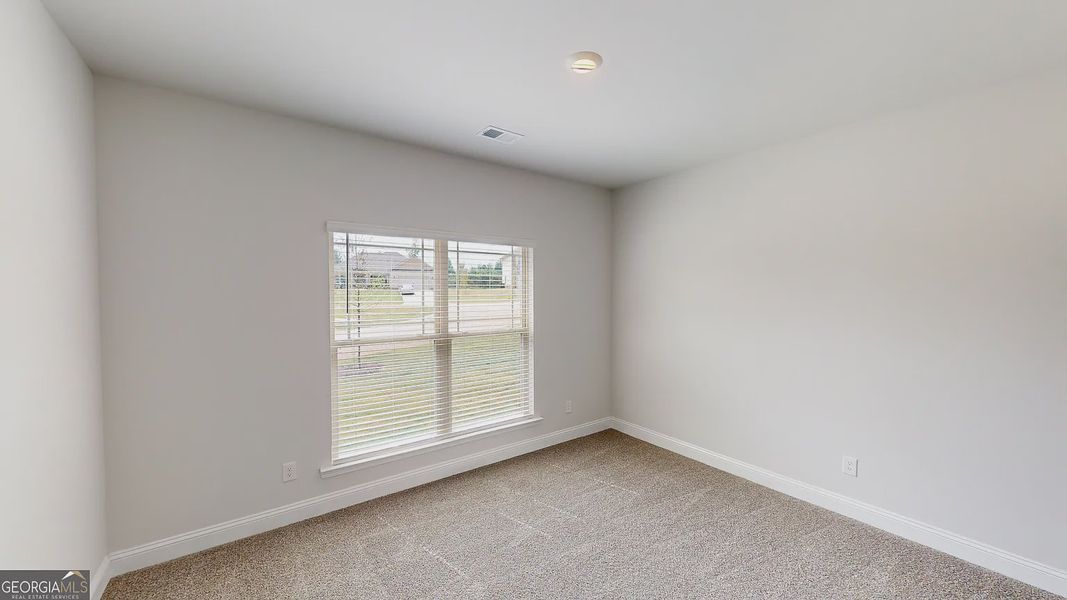 Spacious, unfurnished interior of a new home in Holliday Pass, Griffin (Image 29).