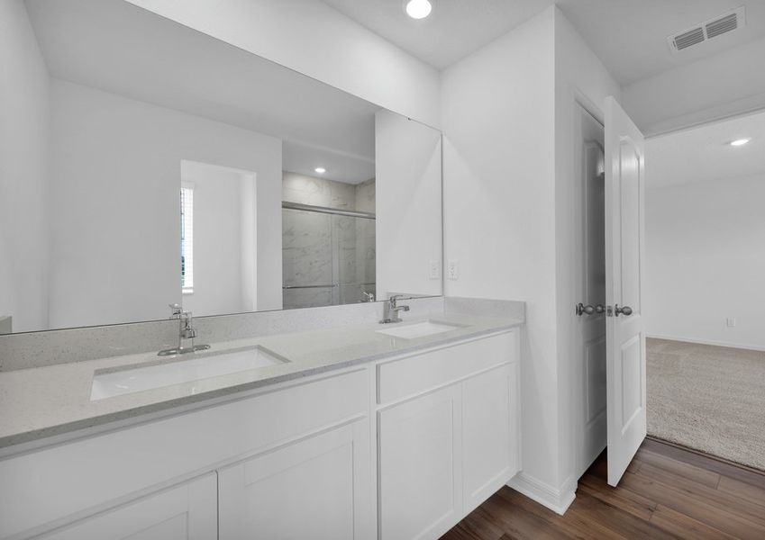 Get ready for your day in the master bathroom